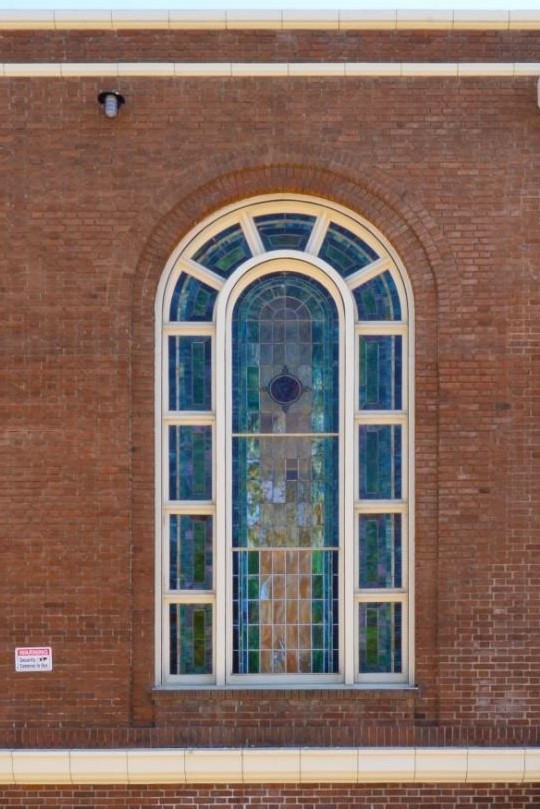 Close up of restored stained glass, north elevation